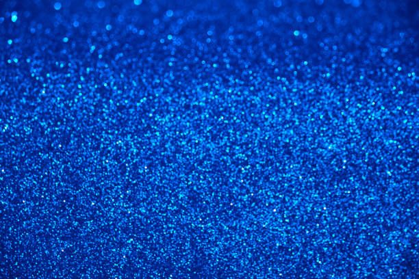 istock blue glitter texture christmas abstract background with bokeh 1279115871