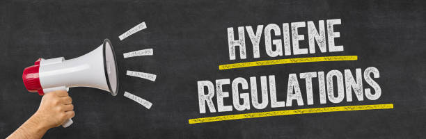 istock Man holding a megaphone - Hygiene Regulations 1279116769