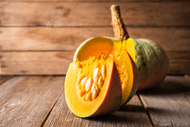 istock Freshly harvested pumpkin sliced on the kitchen table 1279117889