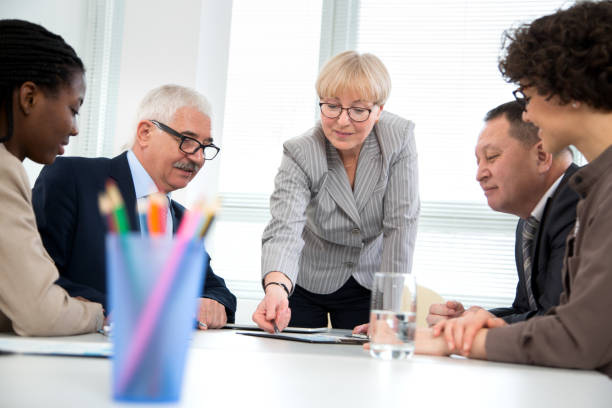 istock Multy-ethnic group of business people working at office 1279118473