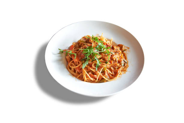 istock White plate with ragu sauce on Linguine. 1279118603