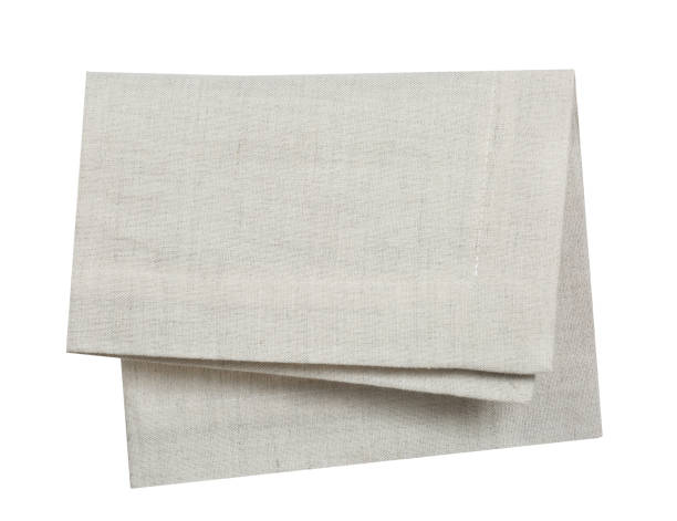 istock Folded beige burlap cloth isolated.Food decoration napkin.Grey tablecloth. 1279120813