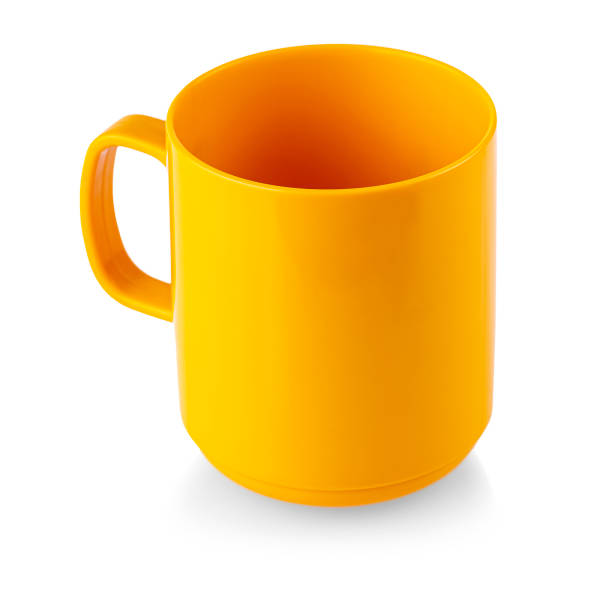 istock Orange cup mug drink on white background isolation 1279122972