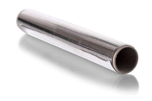 istock A Silver aluminium foil roll isolated on the white background. The foil is extremely pliable and can be bent or wrapped around objects with ease. 1279126185