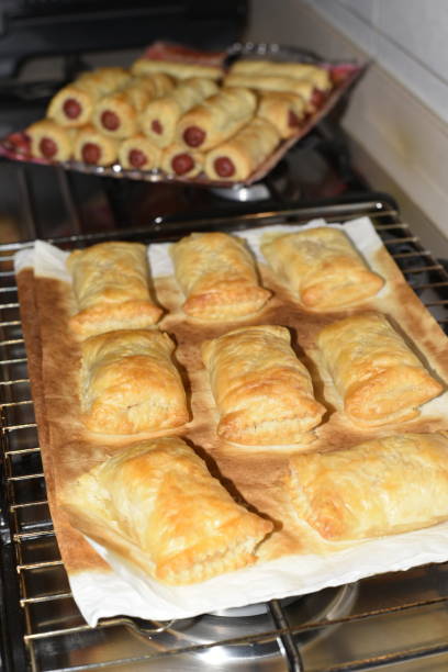 Rustic puff pastry with baked sausages