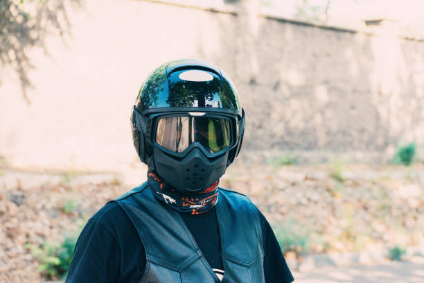 istock biker with black helmet and leather vest 1279128091
