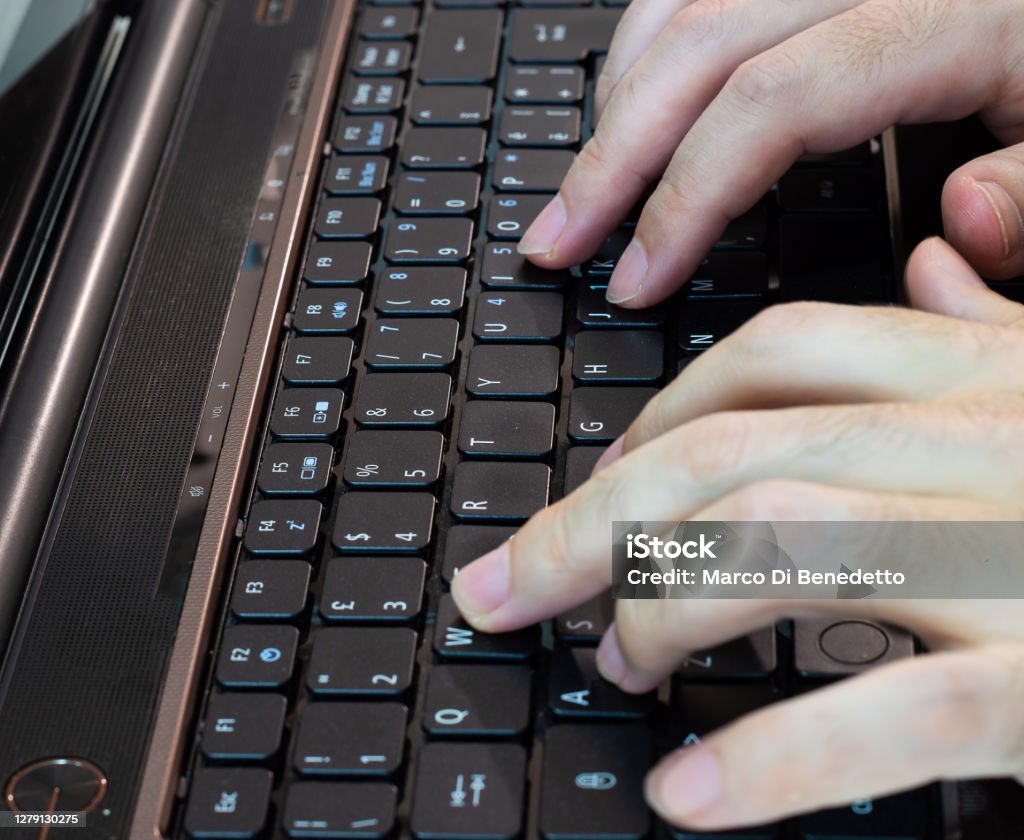 Man Using Keyboard Man Using Keyboard On Laptop Computer Stock Photo - Download Image Now ...