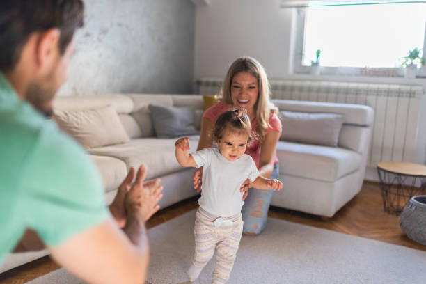 istock First steps of our baby 1279133135
