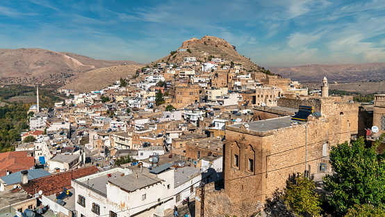 Savur, Mardin, Turkey - January 2020: Town of Savur with old stone houses on a hill