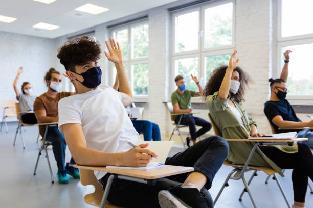 istock Students at university during coronavirus pandemic 1279137383