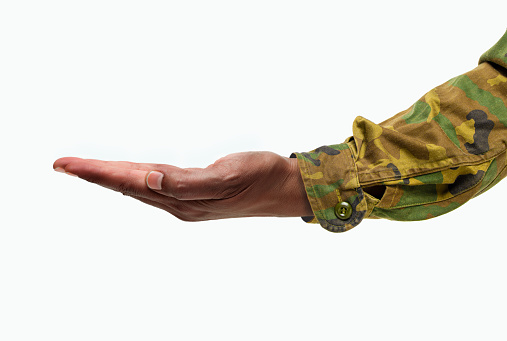 Cropped shot of a side view of a man hand with palm up isolated on a white background