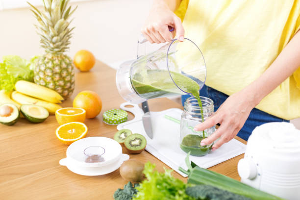 istock Preparing detox fruits smoothie in blender 1279141335