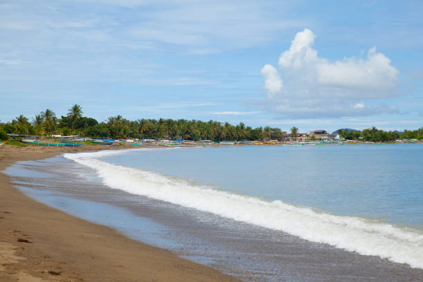 Sea coast with a sandy beach. Caramoan Islands, Philippines.