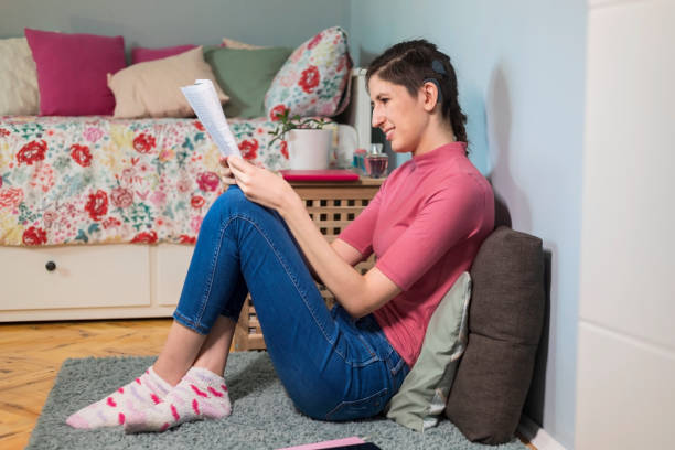 istock Beautiful young woman with cochlear implant 1279141793