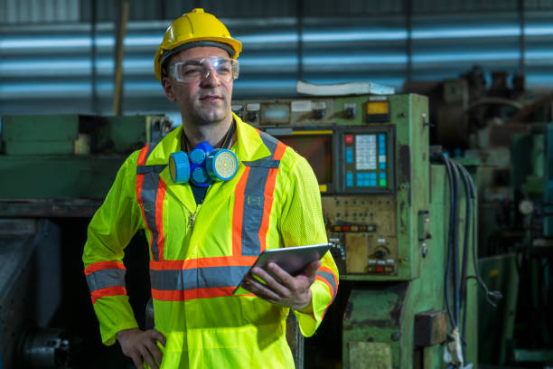 istock Engineers and skilled technicians are holding tablets in an industrial factory. 1279141975