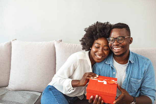 istock Beautiful young couple is celebrating at home. 1279142963