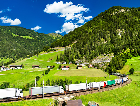 Trucks crossing the Alps by rail at the Brenner Pass in Austria