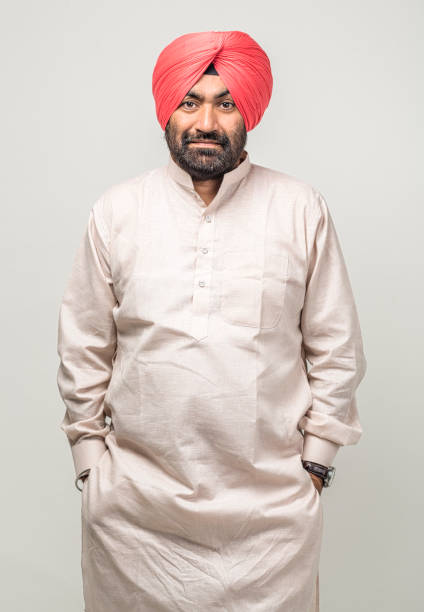 istock Studio portrait of a sikh handsome man looking at camera with smile 1279143743