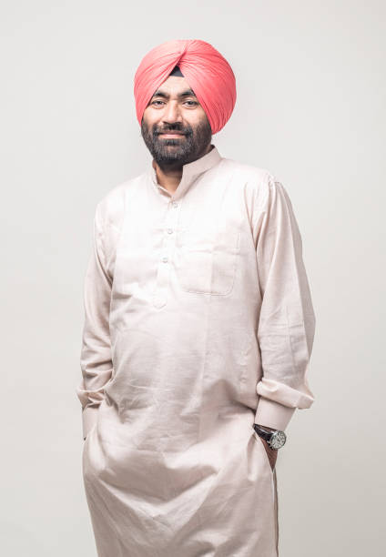 istock Studio portrait of a sikh handsome man looking at camera with smile 1279144861