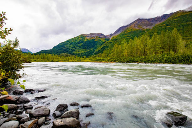 Scenic view of Chugach national park thawed river water from glacier Scenic view of Chugach national park thawed river water from glacier at fall chugach mountains photos stock pictures, royalty-free photos & images