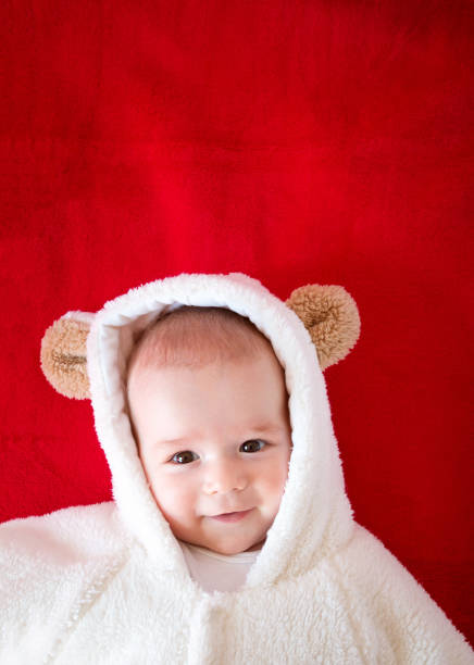 istock Baby in white bear costume 1279148408