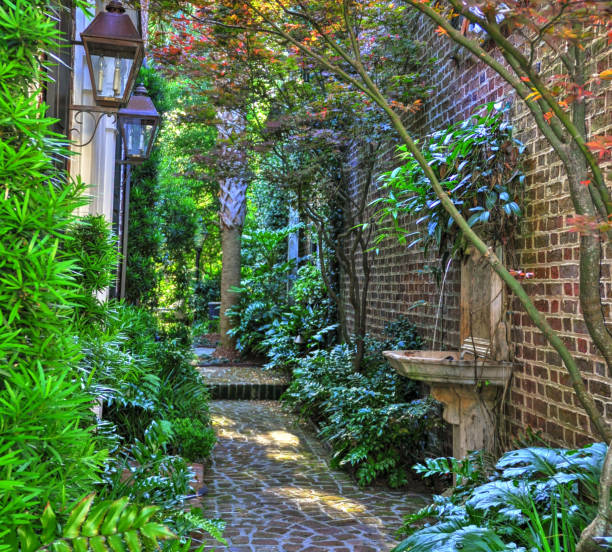 istock Beautiful Brick waling path with fountain-Charleston,  SC 1279149706