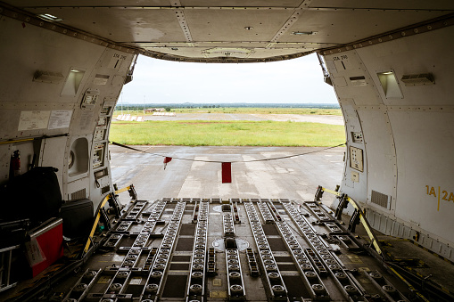 Cameroon, October 3rd 2020: Picture taken at the main deck at the very front of a cargo airplane with open nose hatch.