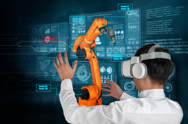 Engineer controls robotic arms by augmented reality industry technology Engineer controls robotic arms by augmented reality industry technology application software. Smart robot machine in future factory working in concept of Industry 4.0 or 4th industrial revolution. computer aided manufacturing photos stock pictures, royalty-free photos & images