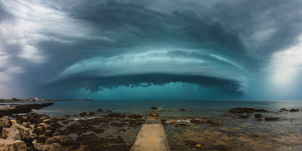 Sea Shelf Arcus Storm with Pier Storm over north Adriatic sea near Umag (Croatia) in summer of august 3rd, 2020. Microburst stock pictures, royalty-free photos & images