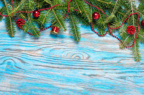 istock Fir branch and red Christmas decorations 1279152435