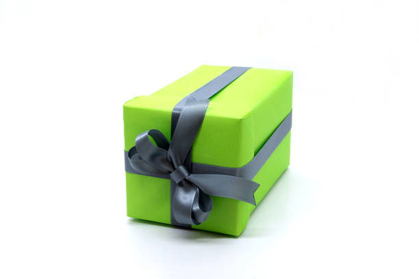 istock Green gift box with ribbon isolated on white background 1279154970