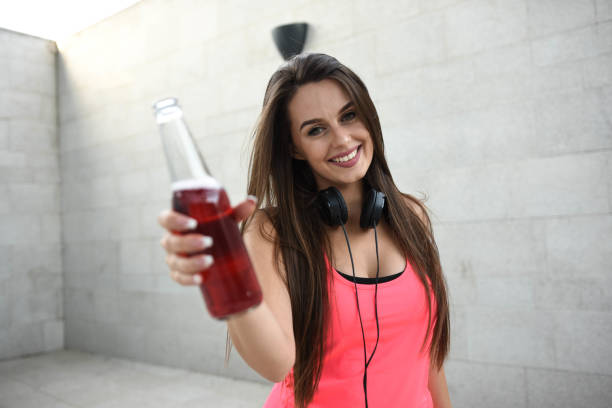 istock Young happy, beautiful woman enjoying refreshment 1279157357