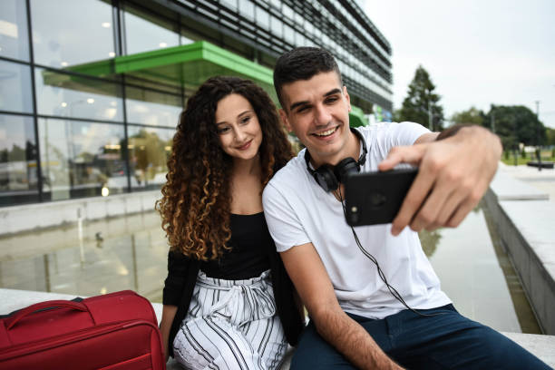 istock Young beautiful couple making selfie 1279158096