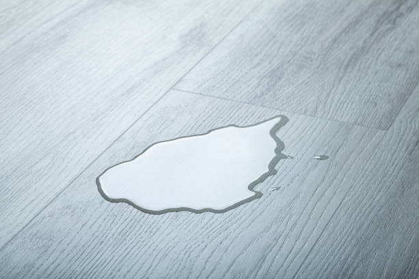 istock Concrete surface with spilled water and liquid. Concrete stone floor texture 1279160728