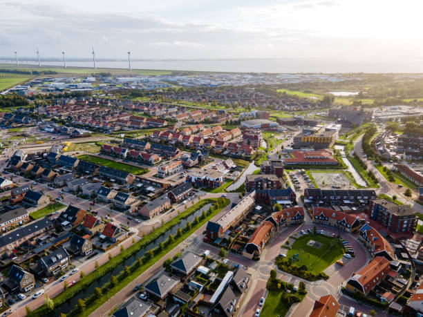 Top view of house Village from Drone capture in the air house is brown roof top Urk netherlands Flevoland Top view of house Village from Drone capture in the air house is brown roof top Urk netherlands Flevoland. High quality photo with drone netherlands photos stock pictures, royalty-free photos & images