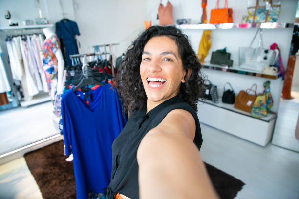 istock Cheerful excited Latin woman taking selfie 1279162465