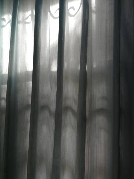 istock Transparent curtain and soft light in bedroom 1279163682