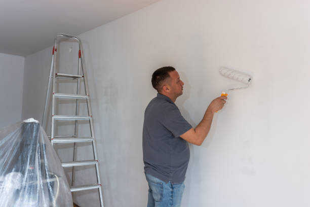 istock Men painting home interior 1279165642