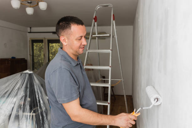 istock Men painting home interior 1279166024
