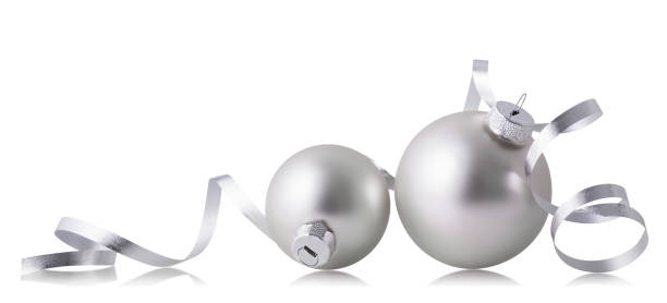 Silver christmas balls with ribbon isolated over white background.