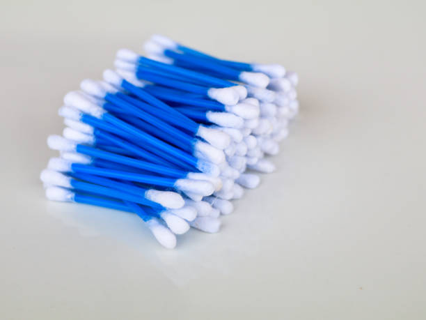 istock Blue color ear cleaning buds in packets against white background 1279168812