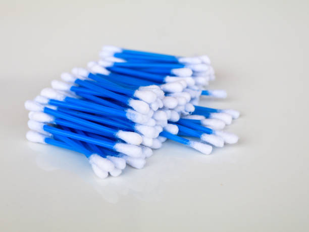 istock Blue color ear cleaning buds in packets against white background 1279168816