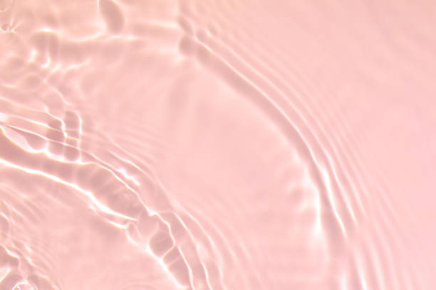 istock pink transparent clear water surface texture summer background 1279169742