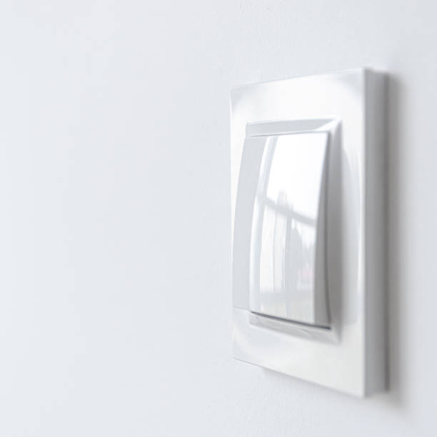 istock A white plastic power switch in an apartment on a white wall 1279170069