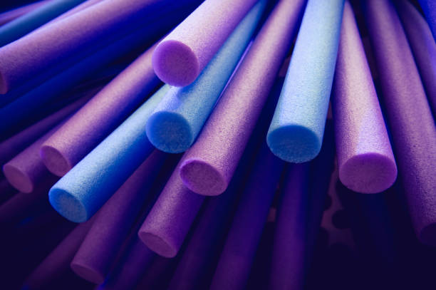 Swimming pool noodles create an interesting and colorful composition.
