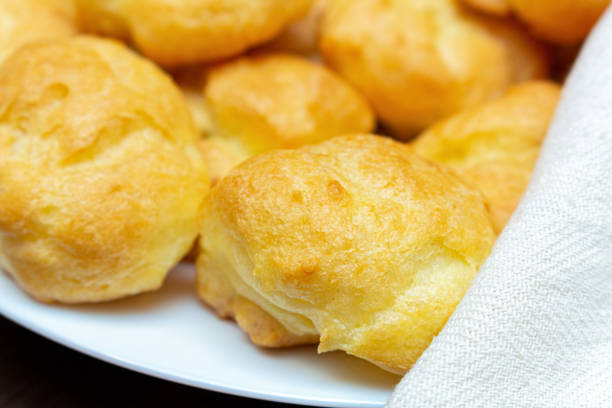 istock homemade profiteroles on a white plate close up 1279171245