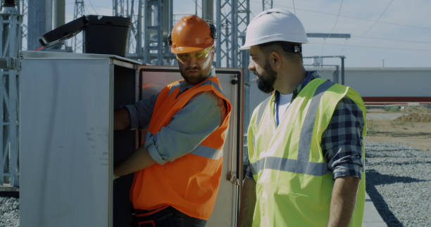istock Engineer showing power transformer to inspectors 1279171729