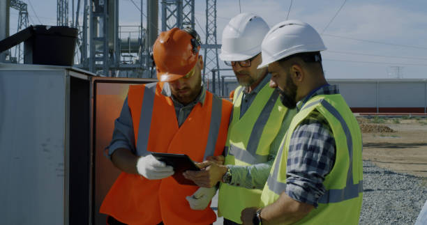 istock Engineer showing power transformer to inspectors 1279171754