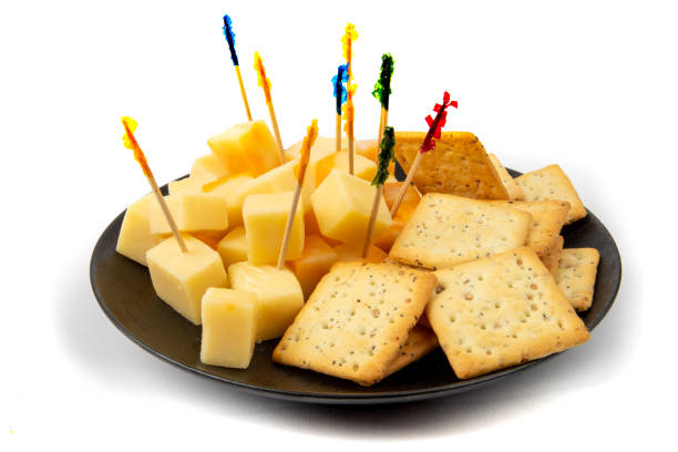 A tasty cheddar cheese and pepperoni appetizer plate for a party
