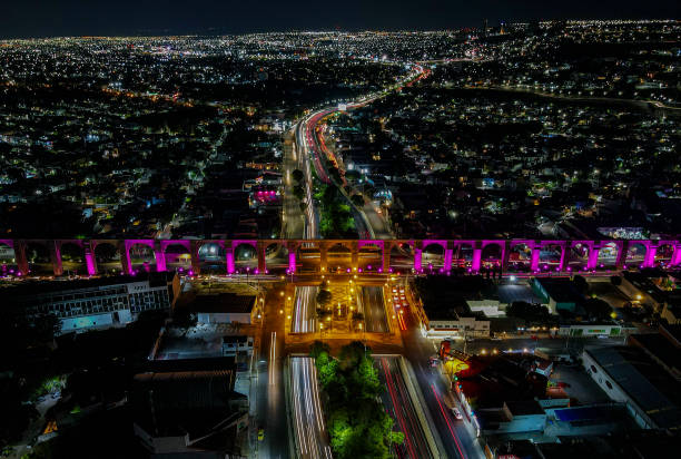 The Arches of Querétaro illuminated in pink in October.